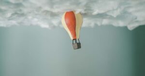 Hot air balloon stuck on the ceiling, illustrating the answer to what is a fractional cmo.