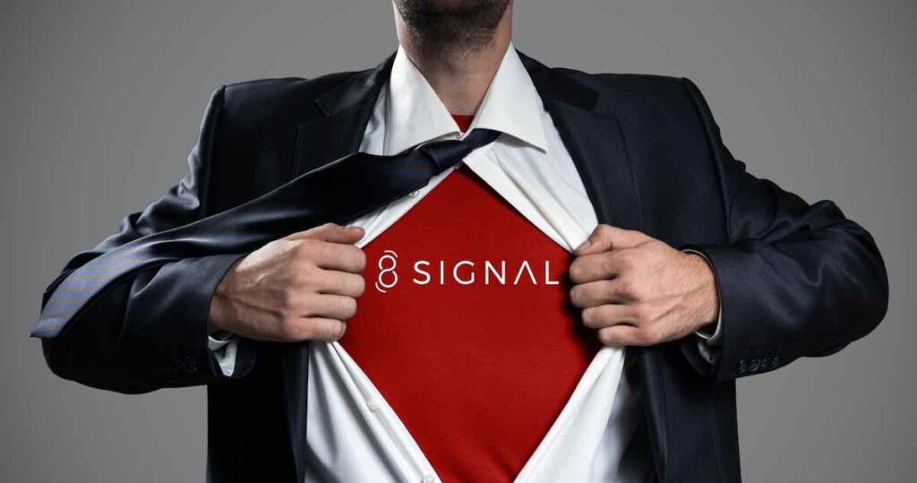 Businessman acting like a superhero and tearing his shirt to show fractional CMO strategy.