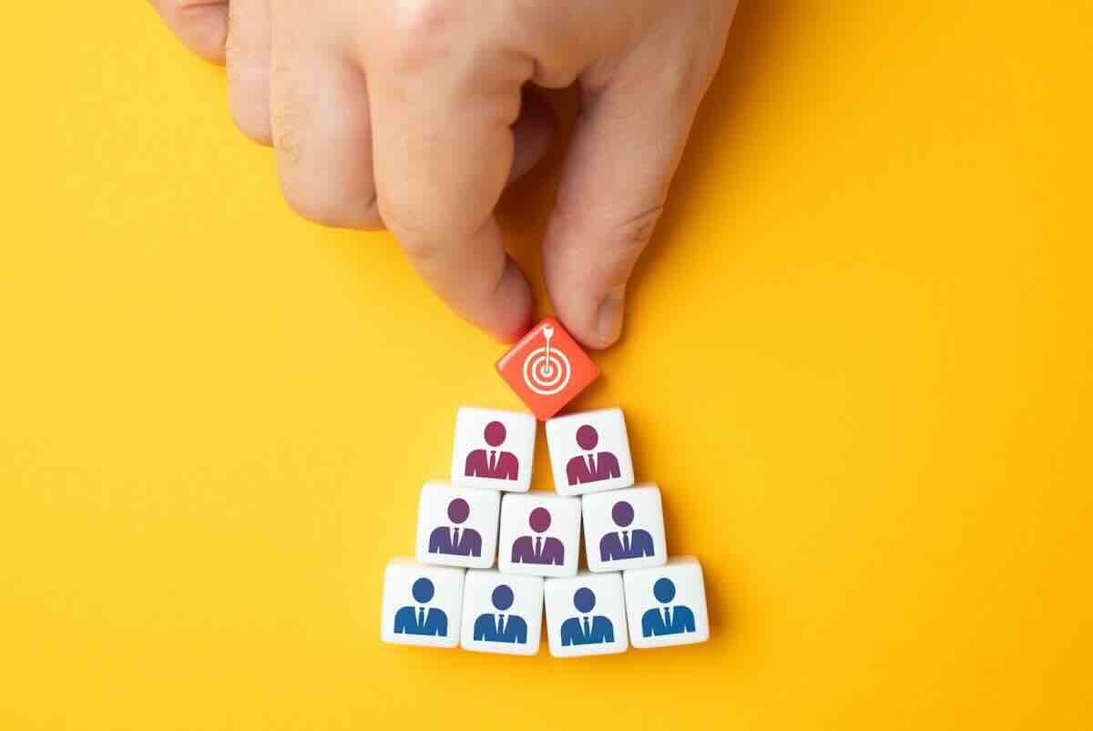 Organization concept on a yellow background representing Fractional CMO services.